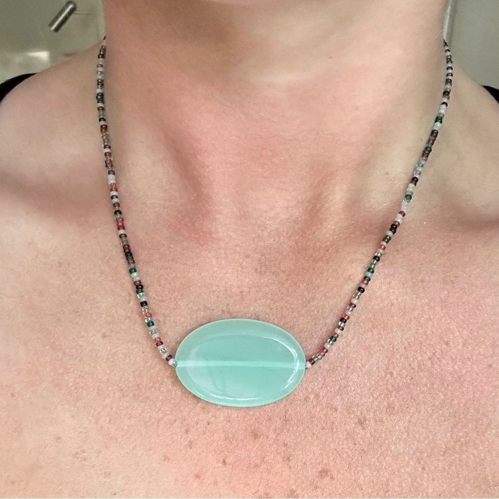 Elegant Beaded Necklace with Aqua Pendant